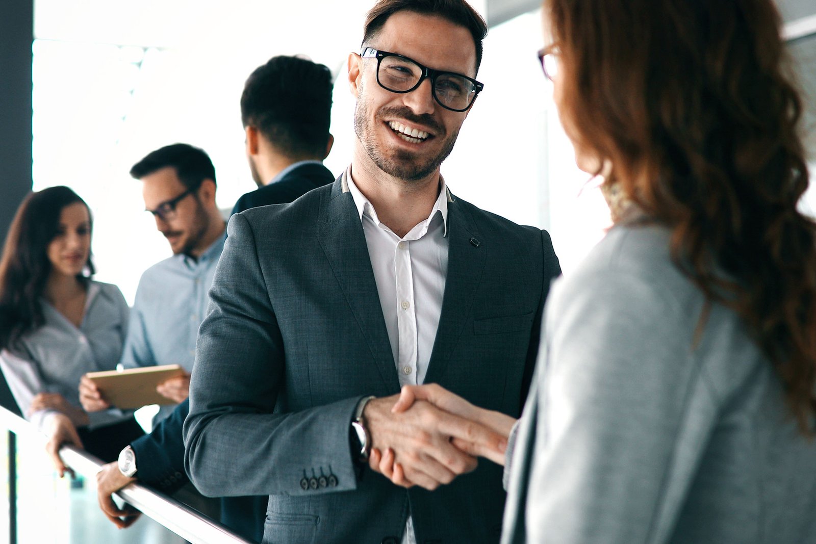 Corporate teamworking colleagues in modern office